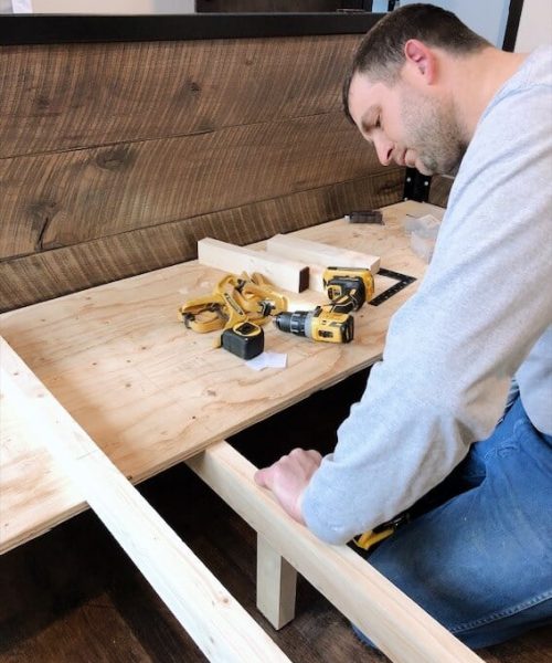 woodworking using drill to build a custom modern industrial bedframe