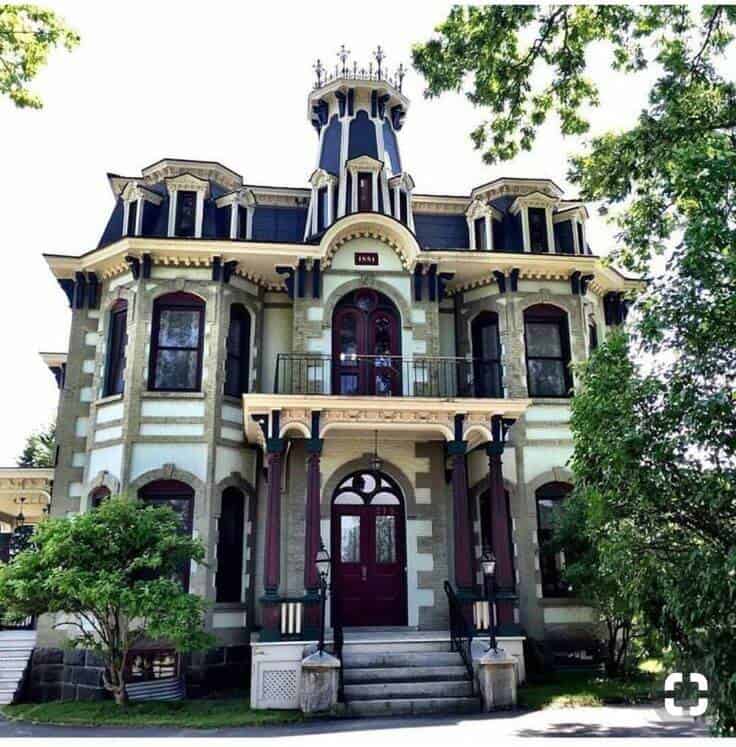 Victorian House exterior with bright colors and stone