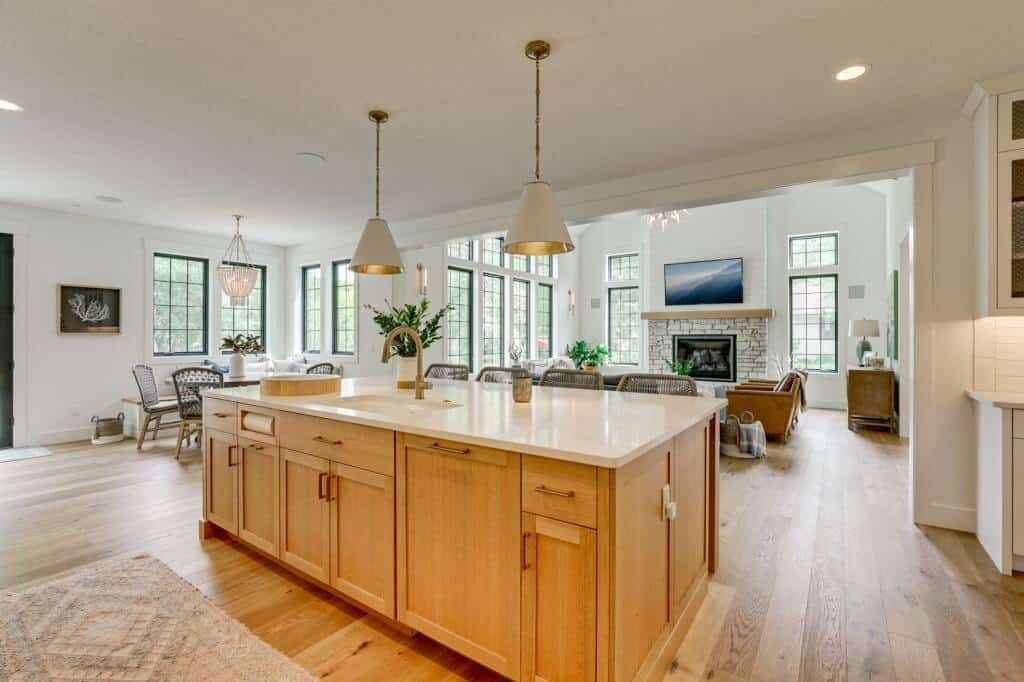 white oak kitchen island white quartz countertop open concept to living room