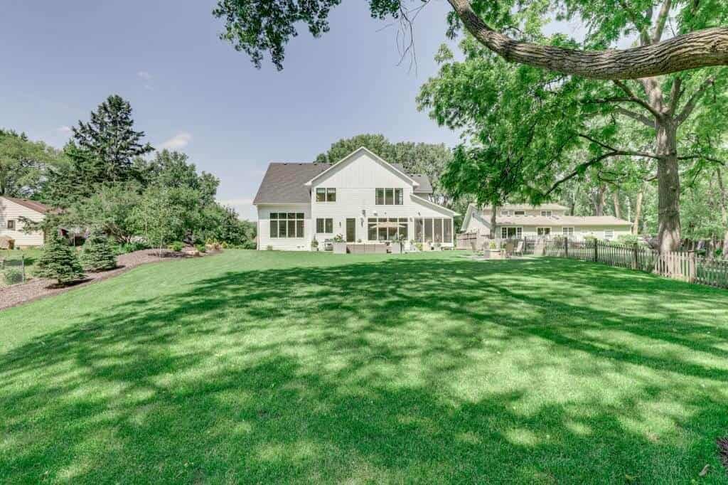 back exterior view white modern farmhouse
