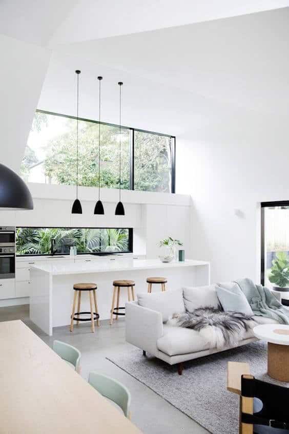 modern all white kitchen with concrete cement tile flooring