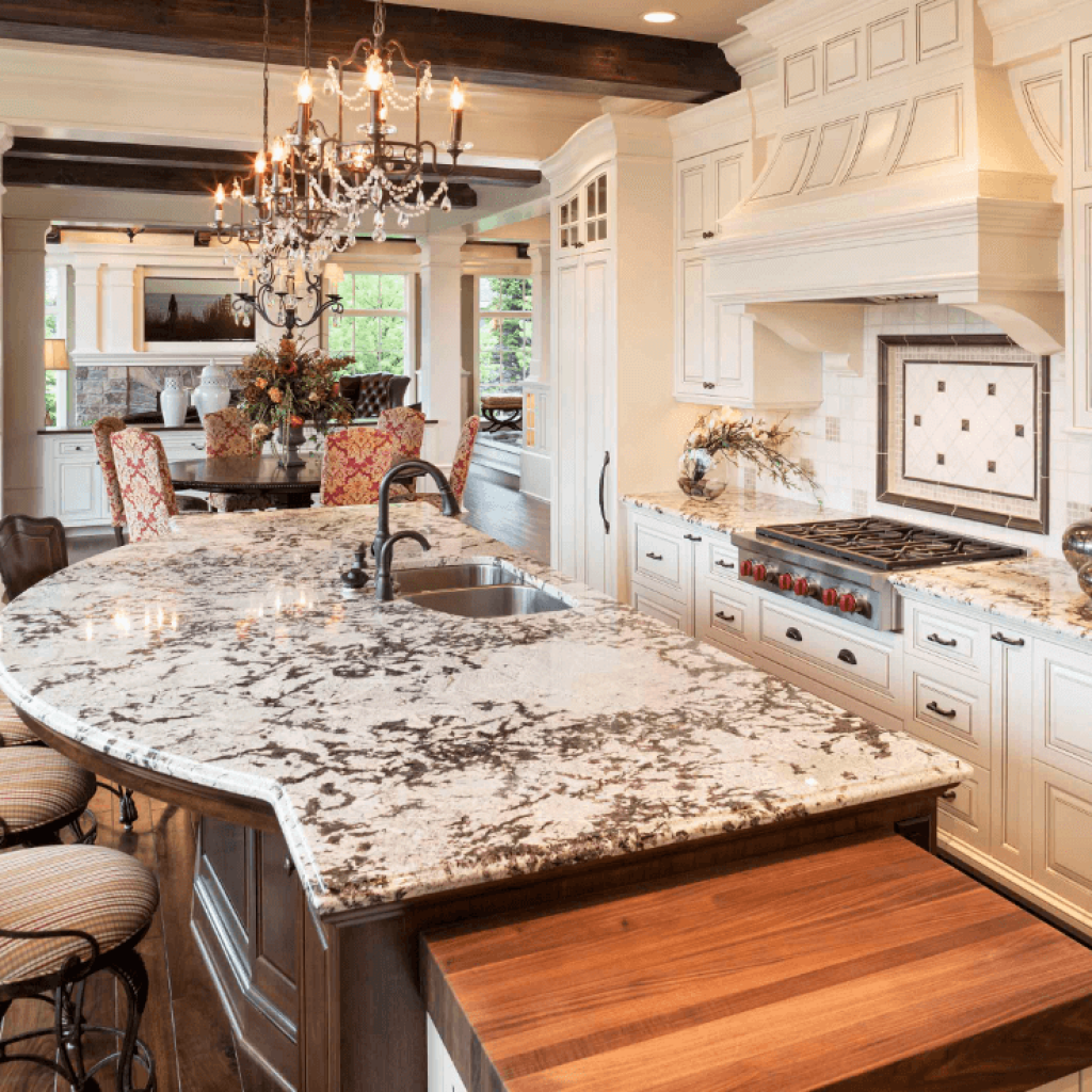 Delicatus White Granite polished countertop in traditional french country cream white kitchen
