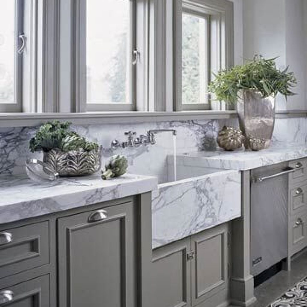 Marble countertop and sink white carrara marble with gray green cabinets luxury kitchen